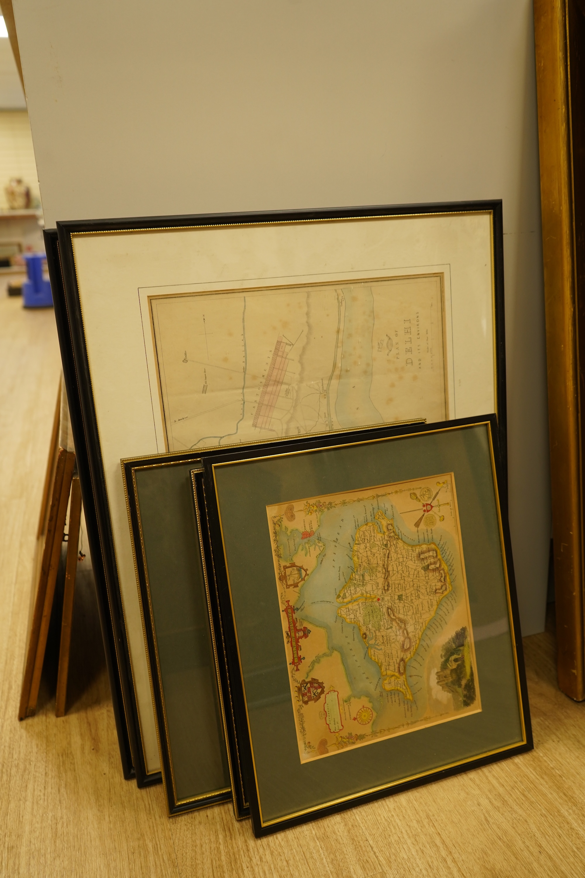 Three 19th century hand coloured maps of the Isle of Wight, a map of the Isle of Man by Edward Weller and a plan of Delhi and its environs, largest 31 x 44cm (5)